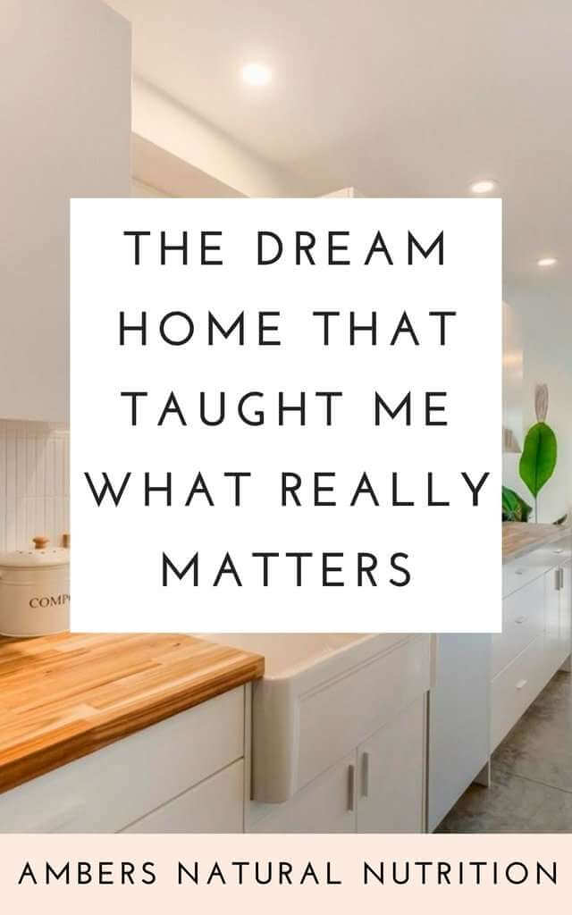 Pinterest graphic featuring a bright modern kitchen with the text “The Dream Home That Taught Me What Really Matters.”