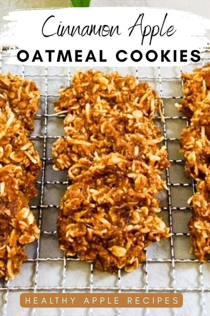Cinnamon apple oatmeal cookies made with rolled oats cooling on a wire rack, featuring text that reads “Cinnamon Apple Oatmeal Cookies” and “Healthy Apple Recipes.”